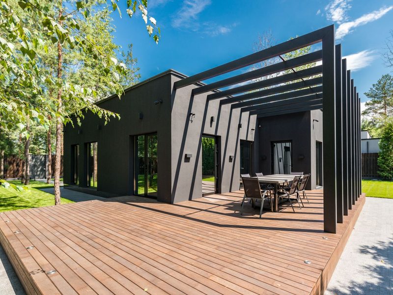 Hillside villa terrace with a wooden deck — the birthday venue